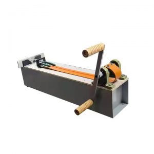 angled front view of manual jewelry wire drawing bench showing crank and drum
