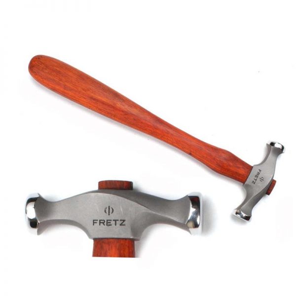 close up of the fretz plannishing hammer head with logo highlighting the polished flat and dome faces