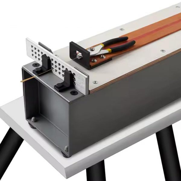 Detail Precision jewelry wire being drawn Manual bench with pliers
