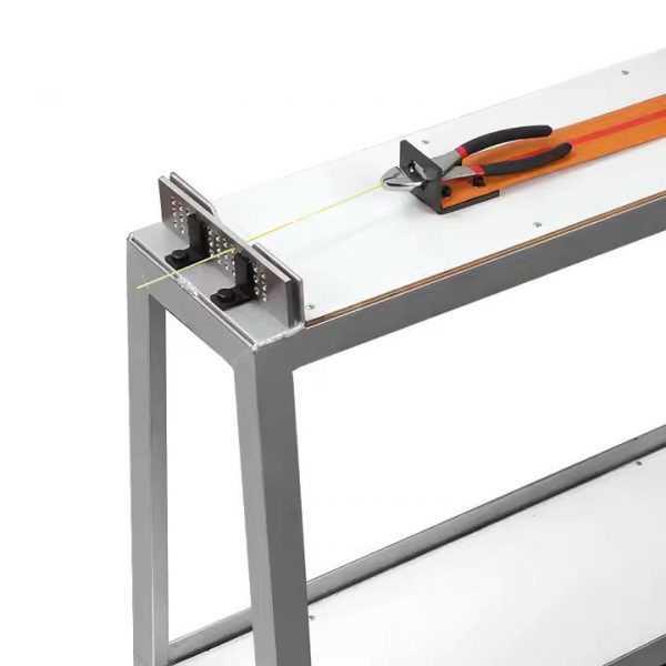 detailed view wire being processed by the high stand manual wire drawing bench