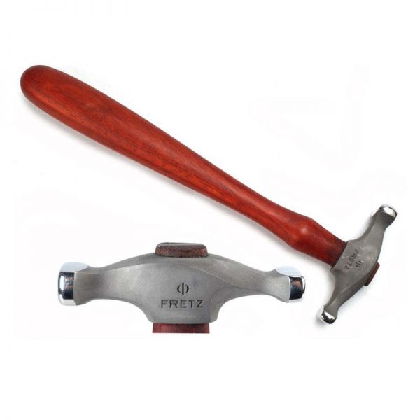 overhead view of the fretz hmr 2 wide raising hammer featuring its wide faces and vibrant reddish wooden handle