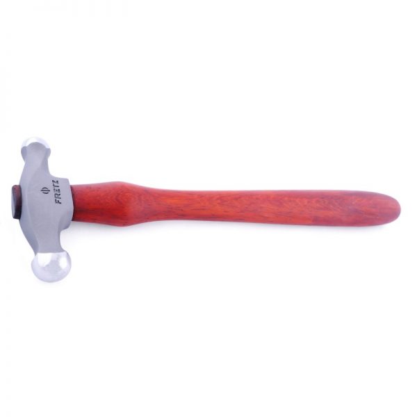overhead view of the fretz large embossing hammer hmr 4 featuring its domed hammer faces and wooden handle