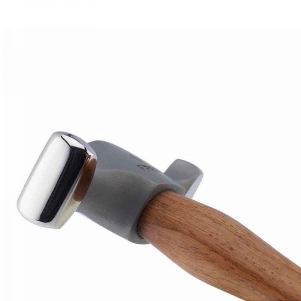 side close up of the fretz hmr 2 wide raising hammer showing its polished wide face and wooden handle for metalworking