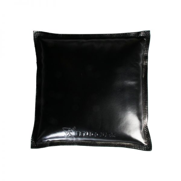 A close-up front view of a single square black jeweler's sandbag