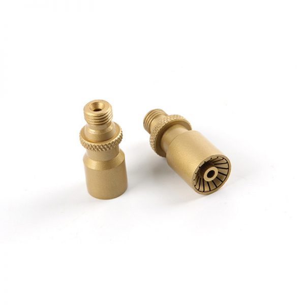A close-up of two brass nozzles from the ORCA® Jewelry Welding Torch kit