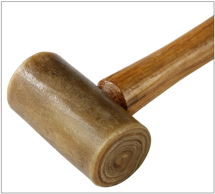 A close-up shot of the rolled cowhide head of a Stuccler mallet, showing its texture and construction