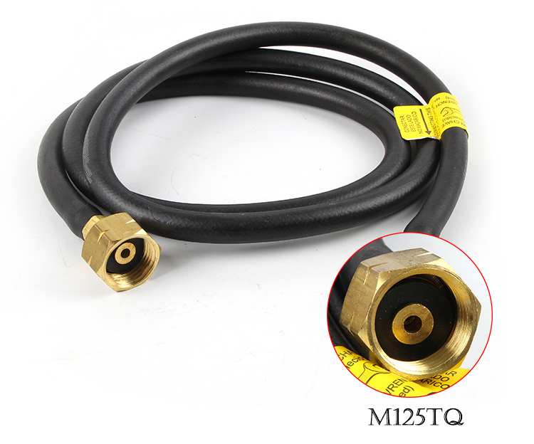 A detailed shot of the long, black gas hose with a brass fitting on the end, suitable for connecting the ORCA torch to a fuel source
