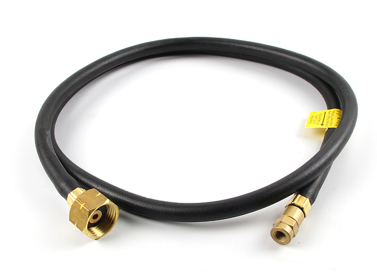A full-length view of the black gas hose with a brass fitting at each end, ready for connecting the torch to a gas tank