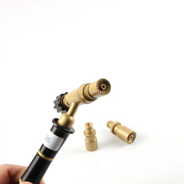 A hand holding the ORCA® Jewelry Welding Torch with two nozzles in the background