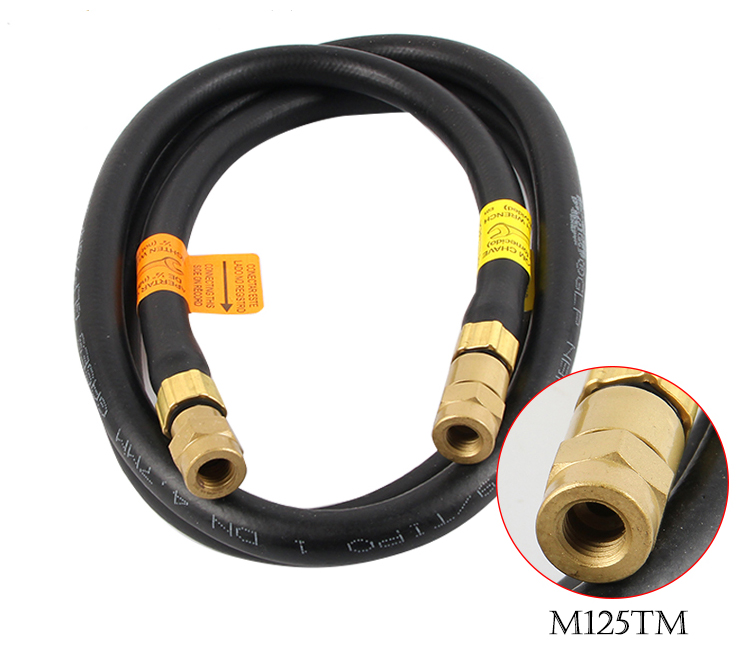 A photo of the ORCA M75 CMB kit's propane gas hose, with yellow safety labels and brass fittings, plus a connector close-up