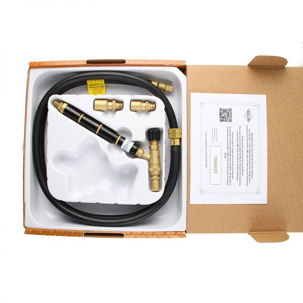 An unboxed view of the ORCA M75 CMF propane torch kit, showing the torch, nozzles, hose, and manual