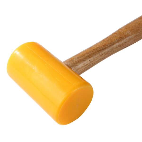 Close-up of a Stuccler polyurethane mallet, highlighting the yellow head and the point where it joins the wooden handle