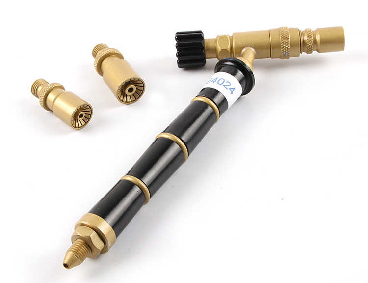 Close-up of the ORCA M75 torch handle and its three nozzles, highlighting their design