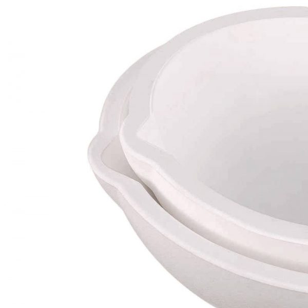 Close-up view of two nested white Stuccler melting crucibles, highlighting the pouring spout