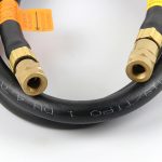 Detailed close-up of the ORCA M125TM hose's brass fittings and the hose material markings