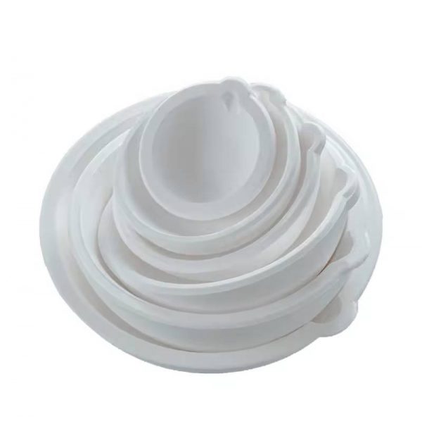 Stack of white Stuccler melting crucibles in various sizes, ranging from 50g to 5kg capacity