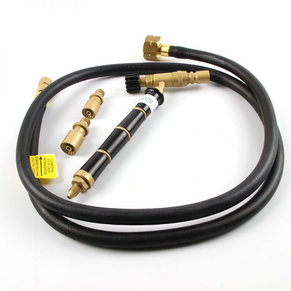 The ORCA® M75 CMG Jewelry Welding Torch and Nozzles KIT laid out on a white surface