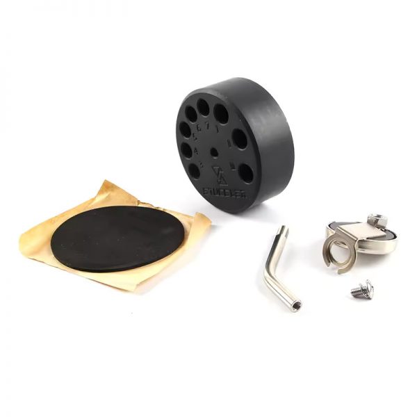 The Stuccler Magnetic Stand components are laid out: tip organizer, arm, magnetic disk, screw, and pad
