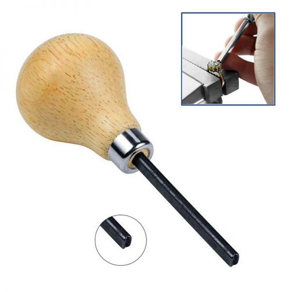 The square-tipped bezel pusher from the Stuccler jewelry setting tool kit, shown with an inlay of it in use on a ring