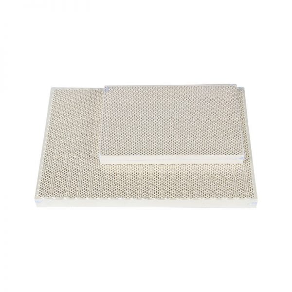 Two rectangular Stuccler honeycomb soldering tiles, one larger than the other, are shown side by side