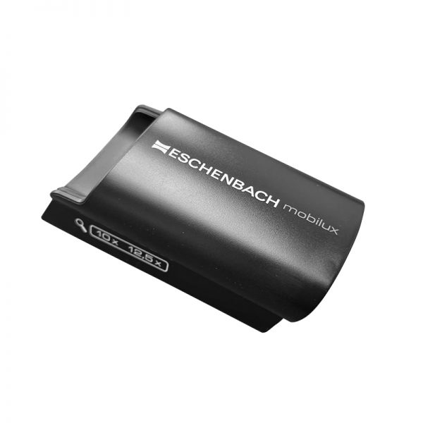A close-up of the black protective case for the Eschenbach Mobilux magnifier, showing the brand and magnification details.