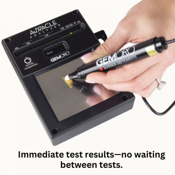 A person testing a gold nugget on the GEMORO AuRACLE Analyzer. The text emphasizes "Immediate test results—no waiting between tests."