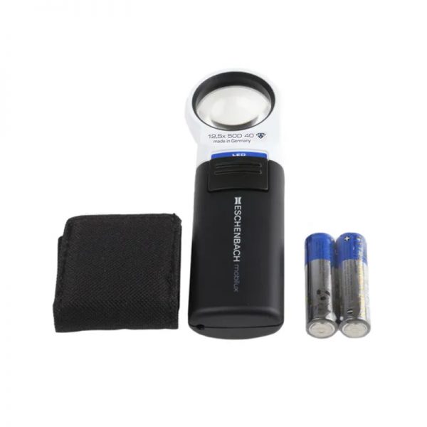 The black Eschenbach Mobilux LED magnifier is shown with its protective pouch and two included AA batteries.