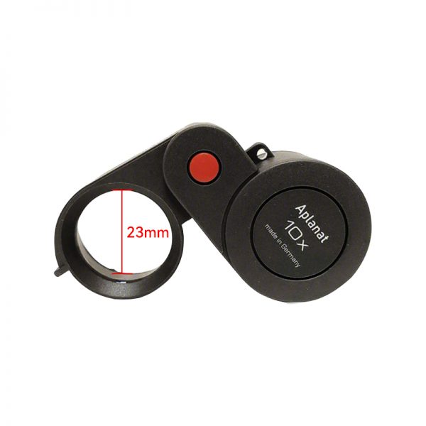 The folded Eschenbach magnifier with an overlay showing the 23mm lens diameter measurement.