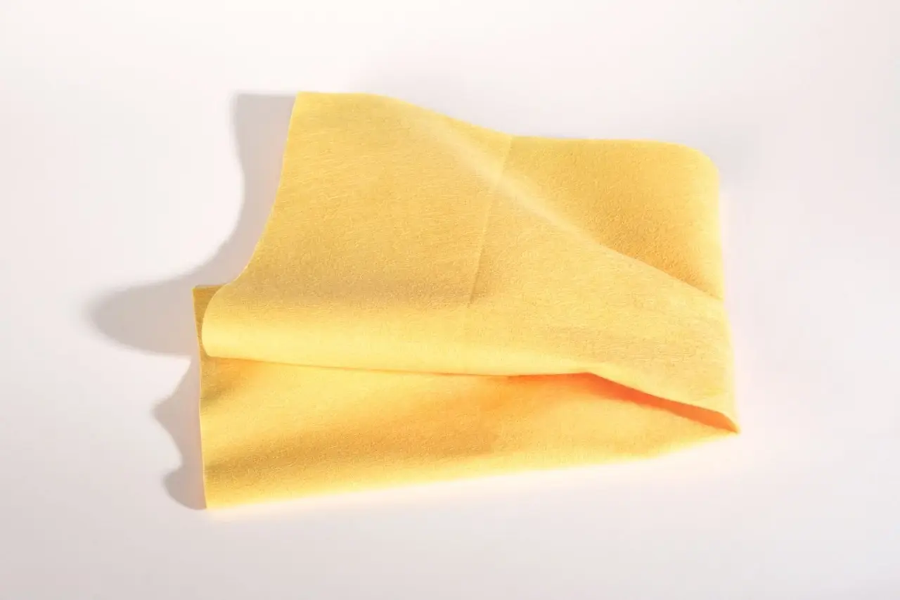 yellow folded jewelry polishing cloth